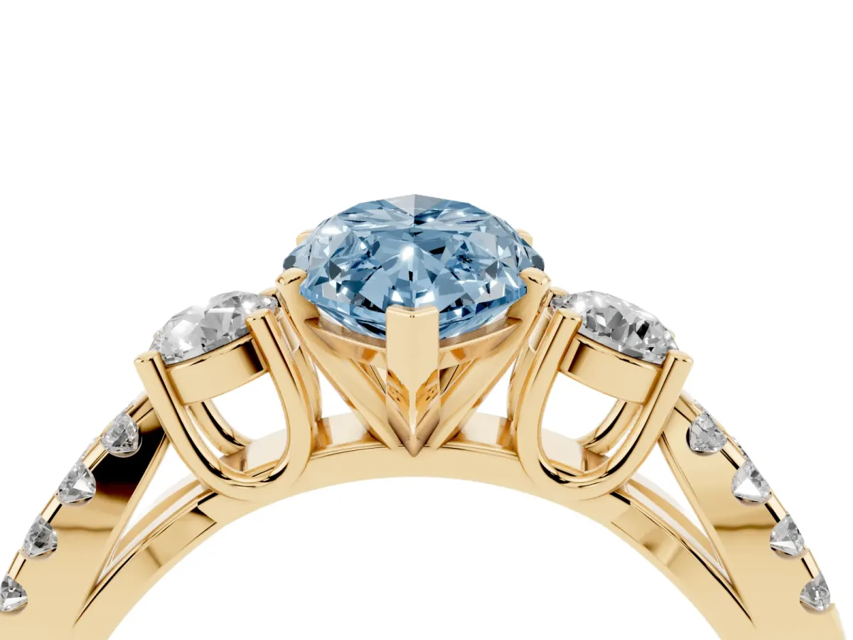 Fancy Blue Marquise Cut Diamond Three-Stone Ring with Pavé Split Shank and Four-Prong Setting Yellow gold