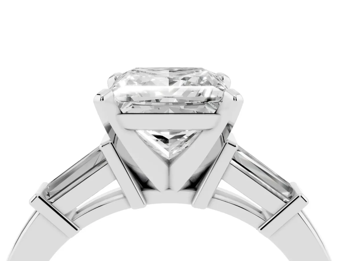 Princess Cut Cut Diamond Solitaire Ring with Tapered Baguette Accents and Four-Prong Setting Silver
