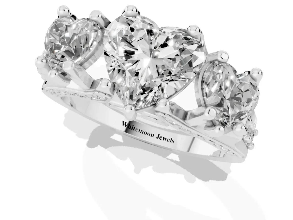 Heart Cut Diamond Three-Stone Ring with Channel Set Band and Four-Prong Setting Silver