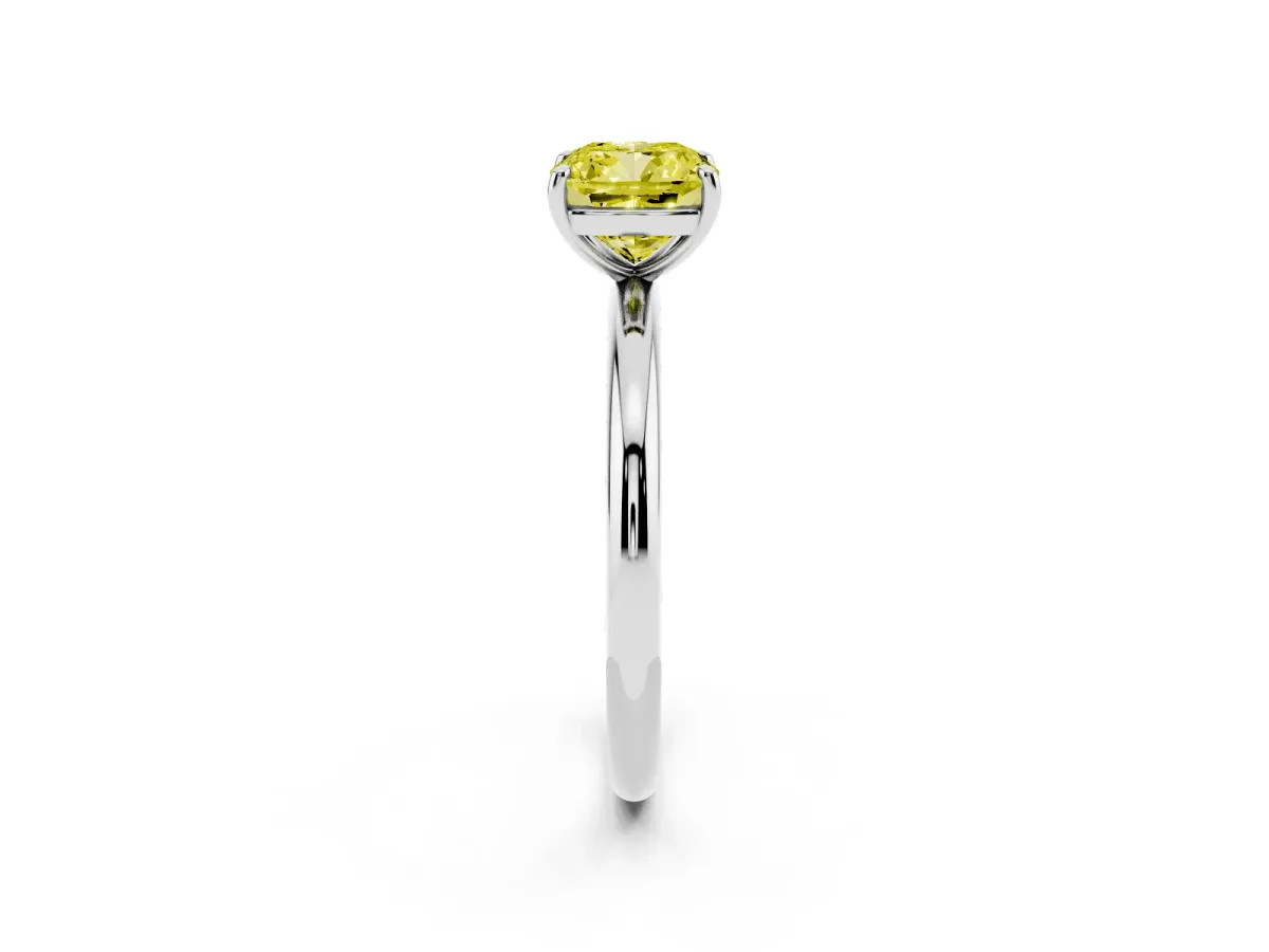 Fancy Yellow Cushion Cut Solitaire Diamond Ring with Four-Prong Setting on a Plain Band Silver