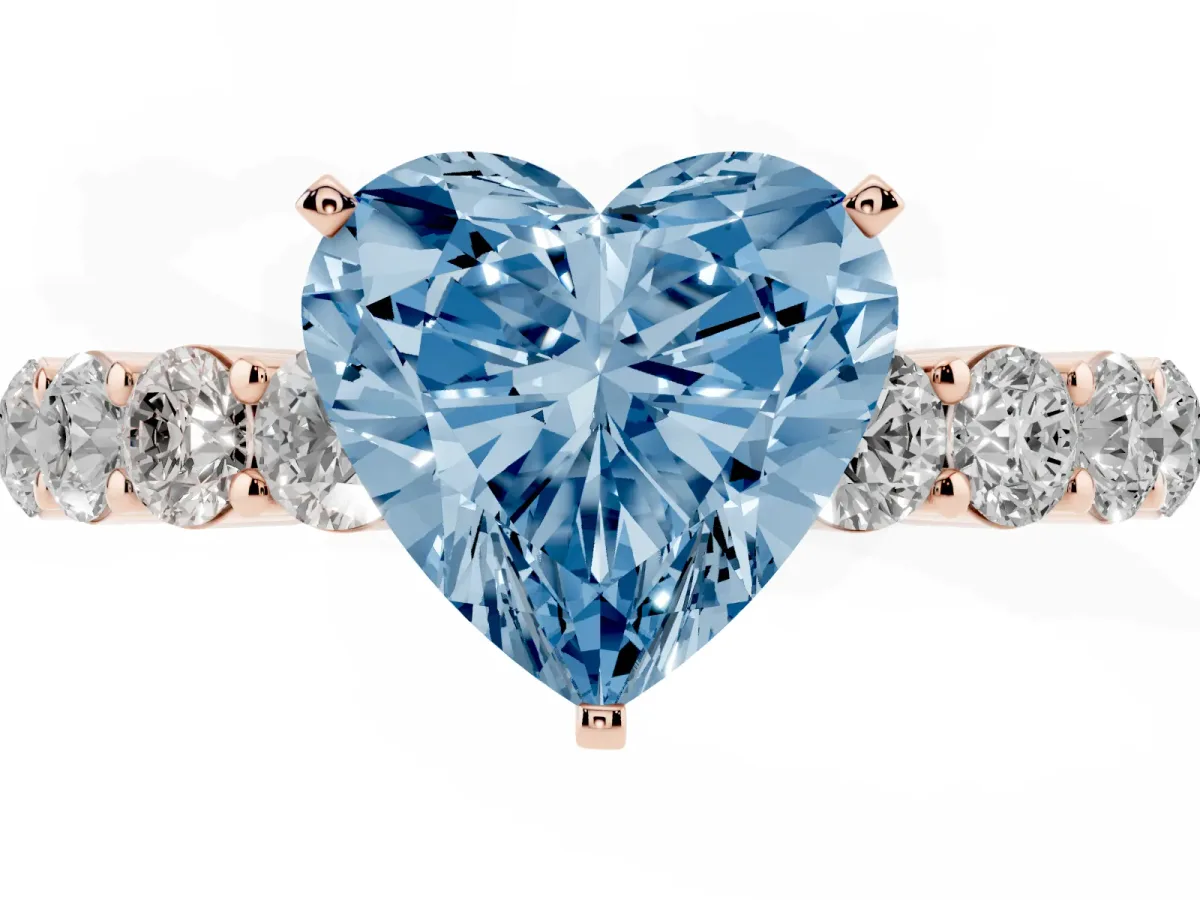 Fancy Blue Heart Cut Diamond Solitaire Ring with Shared Prong Round Side Stones Rose gold