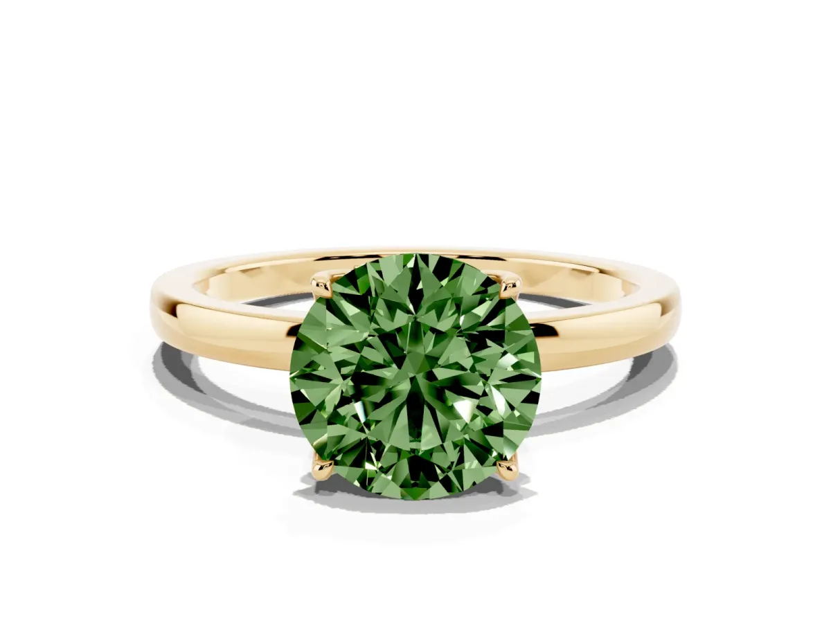 Fancy Green Round Cut Diamond Solitaire Ring with Thin Band and Prong Setting Yellow gold