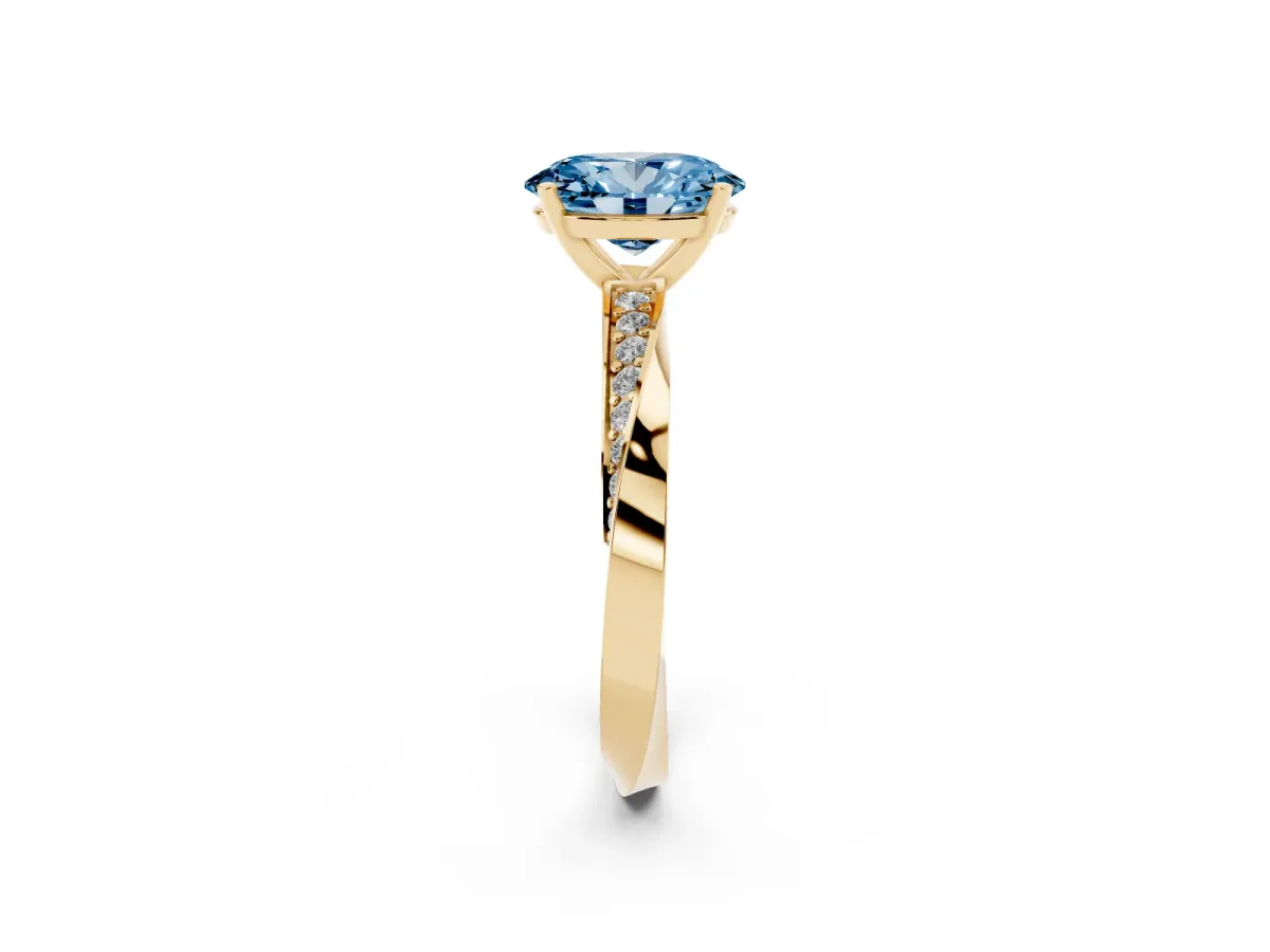Fancy Blue Oval Cut Diamond Engagement Ring with Side Stone Accents and Four-Prong Setting Yellow gold