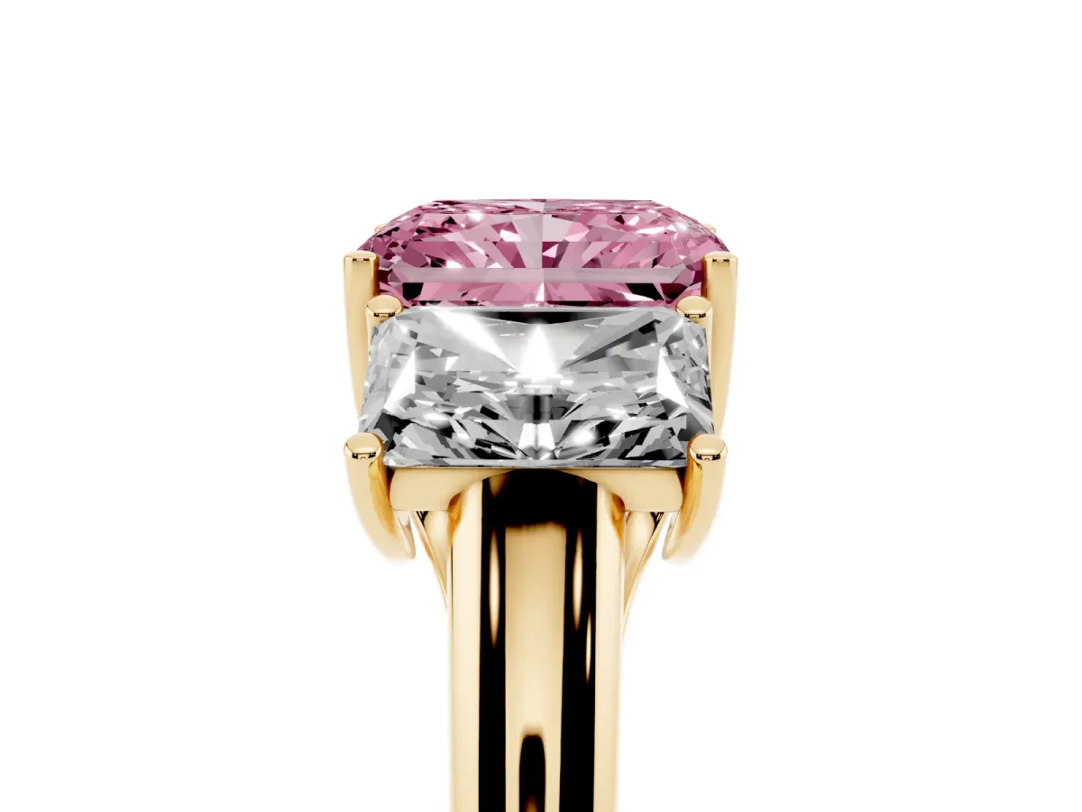 Fancy Pink Three-Stone Radiant Cut Diamond Engagement Ring with Prong Setting Yellow gold