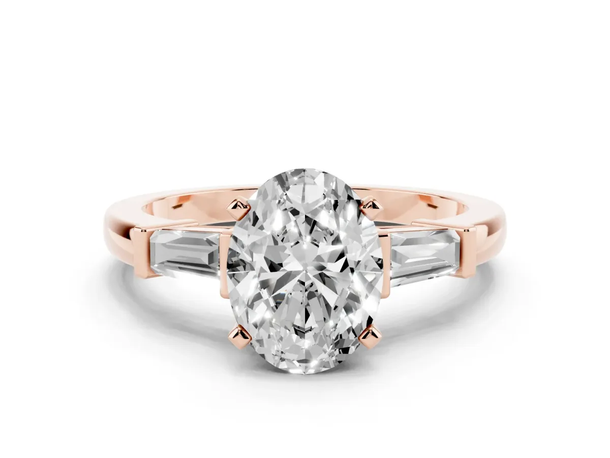 Oval Cut Cut Diamond Solitaire Ring with Tapered Baguette Accents and Four-Prong Setting Rose gold