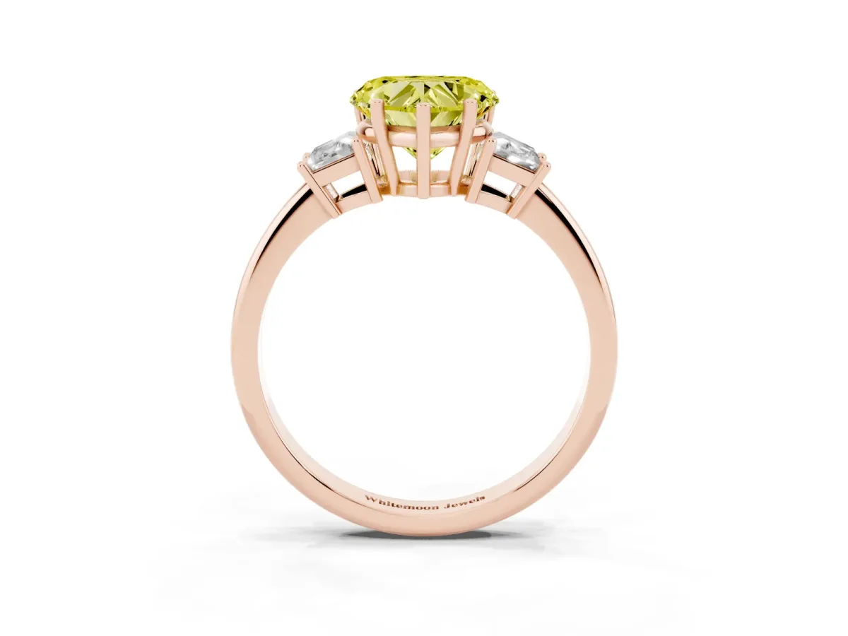 Fancy Yellow Heart Cut Diamond Three-Stone Ring with Trapezoid Side Stones and Prong Setting Rose gold