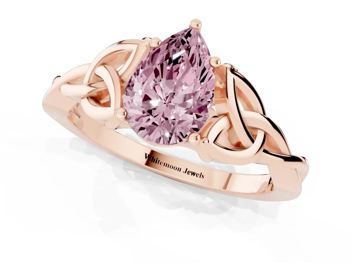 Fancy Pink Pear Cut Diamond Solitaire Engagement Ring with Celtic Knot Band and Four-Prong Setting Rose gold