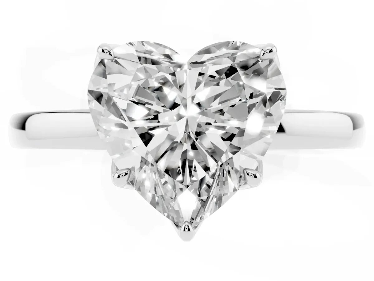 Heart Cut Diamond Solitaire Ring with Thin Band and Prong Setting Silver