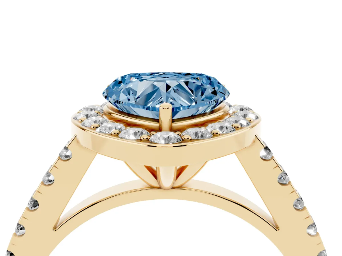 Fancy Blue Heart Cut Diamond Halo Ring with Round Pavé Split Shank and Prong Setting Yellow gold
