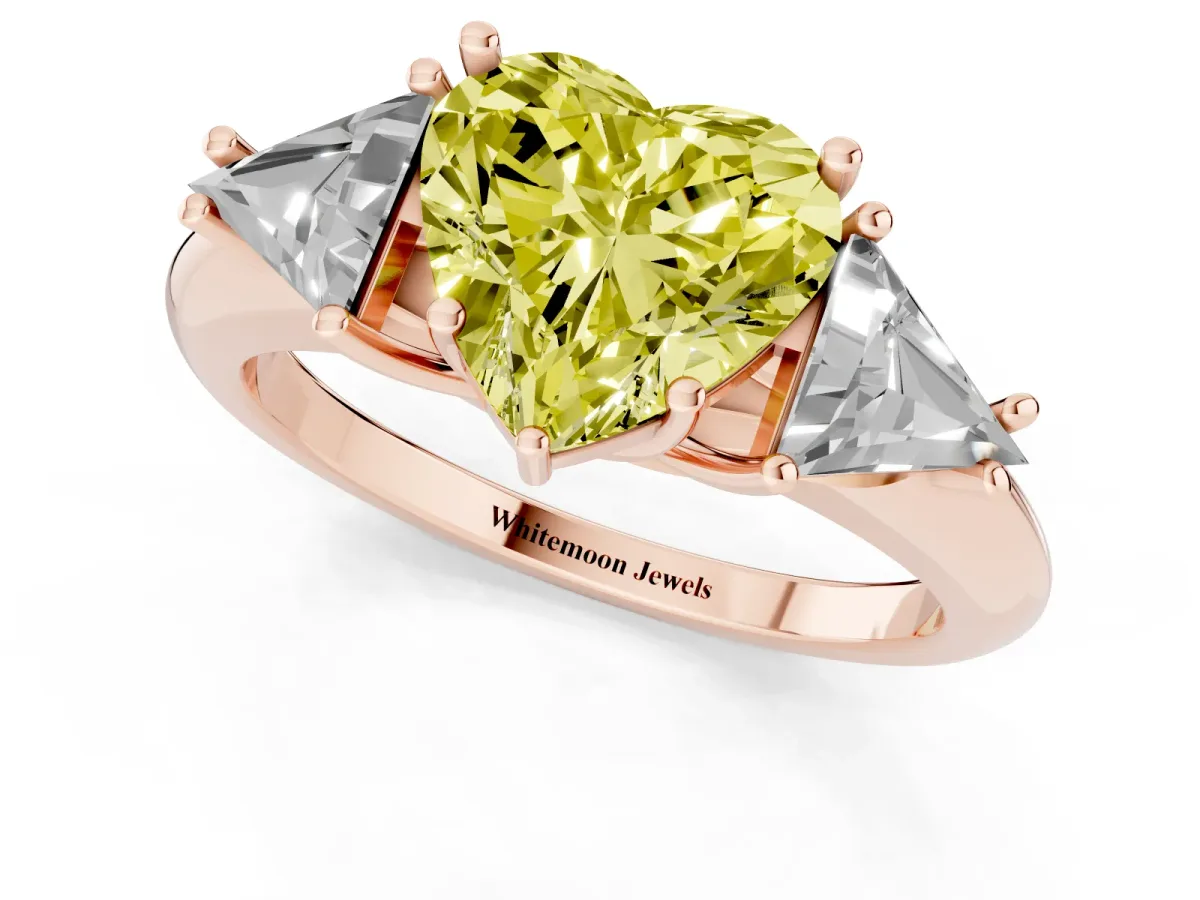 Fancy Yellow Three-Stone Heart Cut Diamond Engagement Ring with Trillion Side Stones and Prong Setting Rose gold