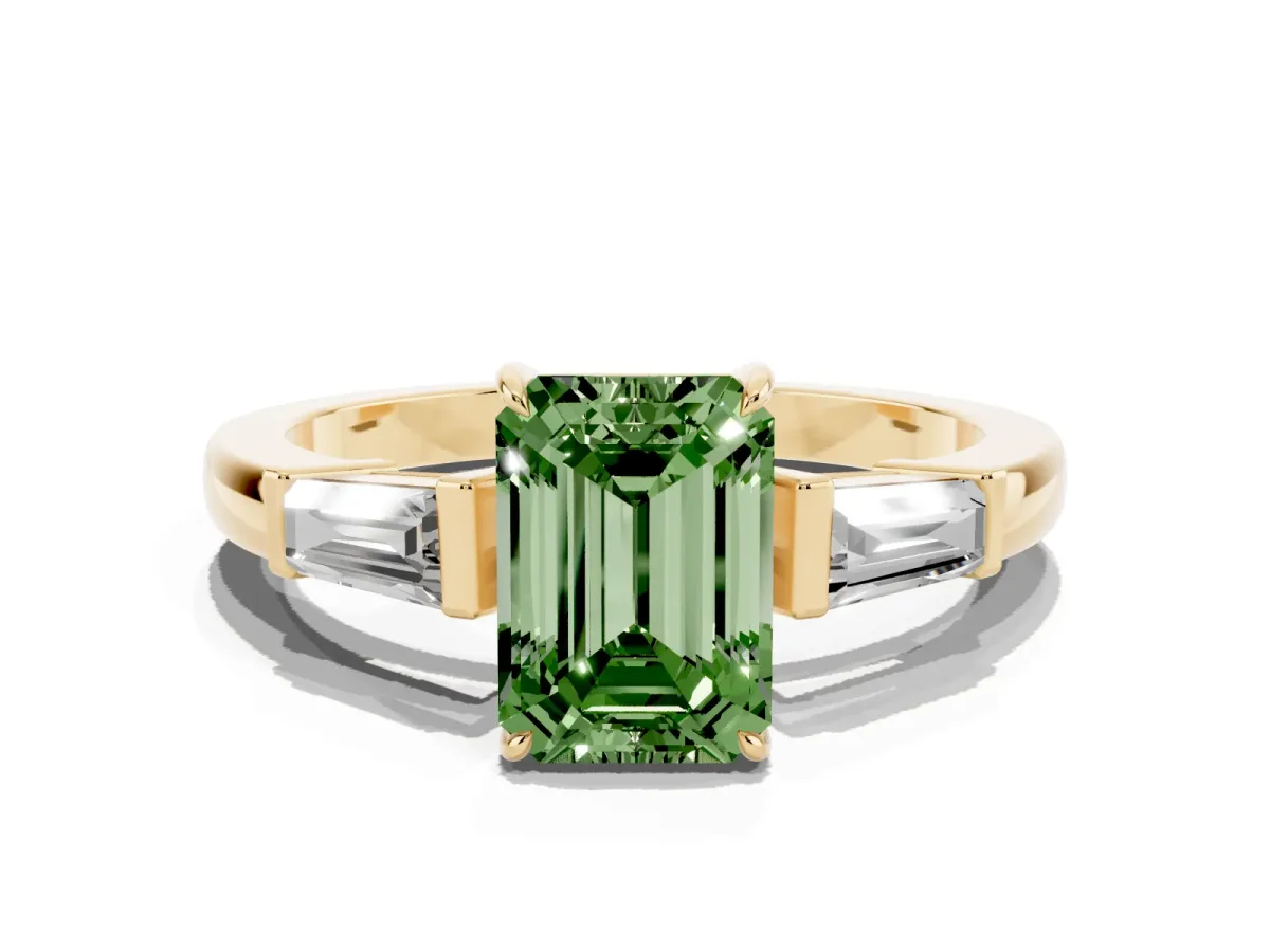 Fancy Green Emerald Cut Diamond Three-Stone Ring with Tapered Baguette Side Stones and Prong Setting Yellow gold
