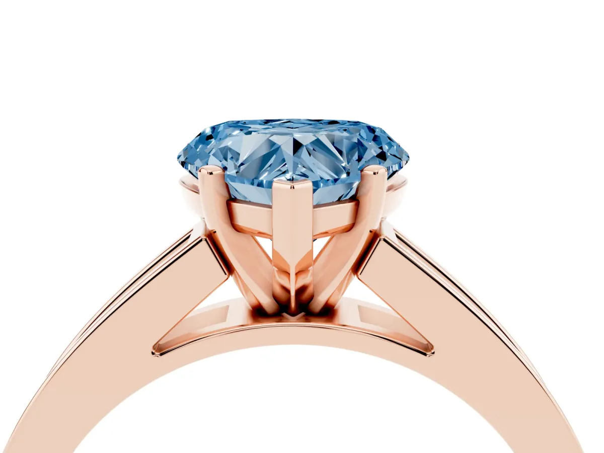 Fancy Blue Heart Cut Solitaire Diamond Ring with Channel-Set Band and Four-Prong Setting Rose gold