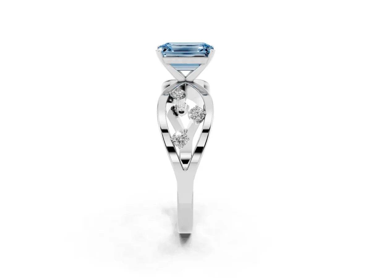 Fancy Blue Emerald Cut Cut Solitaire Diamond with Side Stones on Criss-Cross Band and Four-Prong Setting Platinum