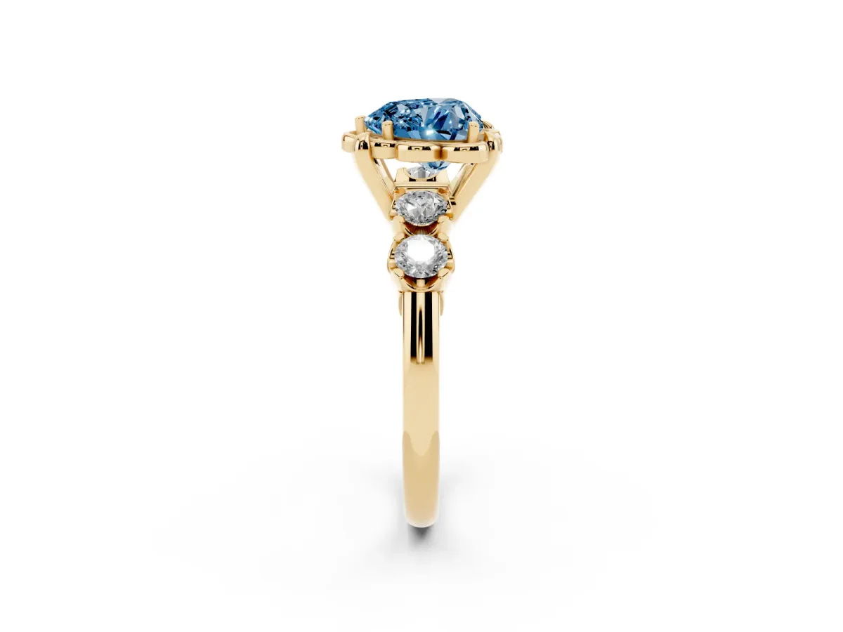 Fancy Blue Heart Cut Cut Diamond Floral Halo Engagement Ring with Shared Prong Setting Yellow gold