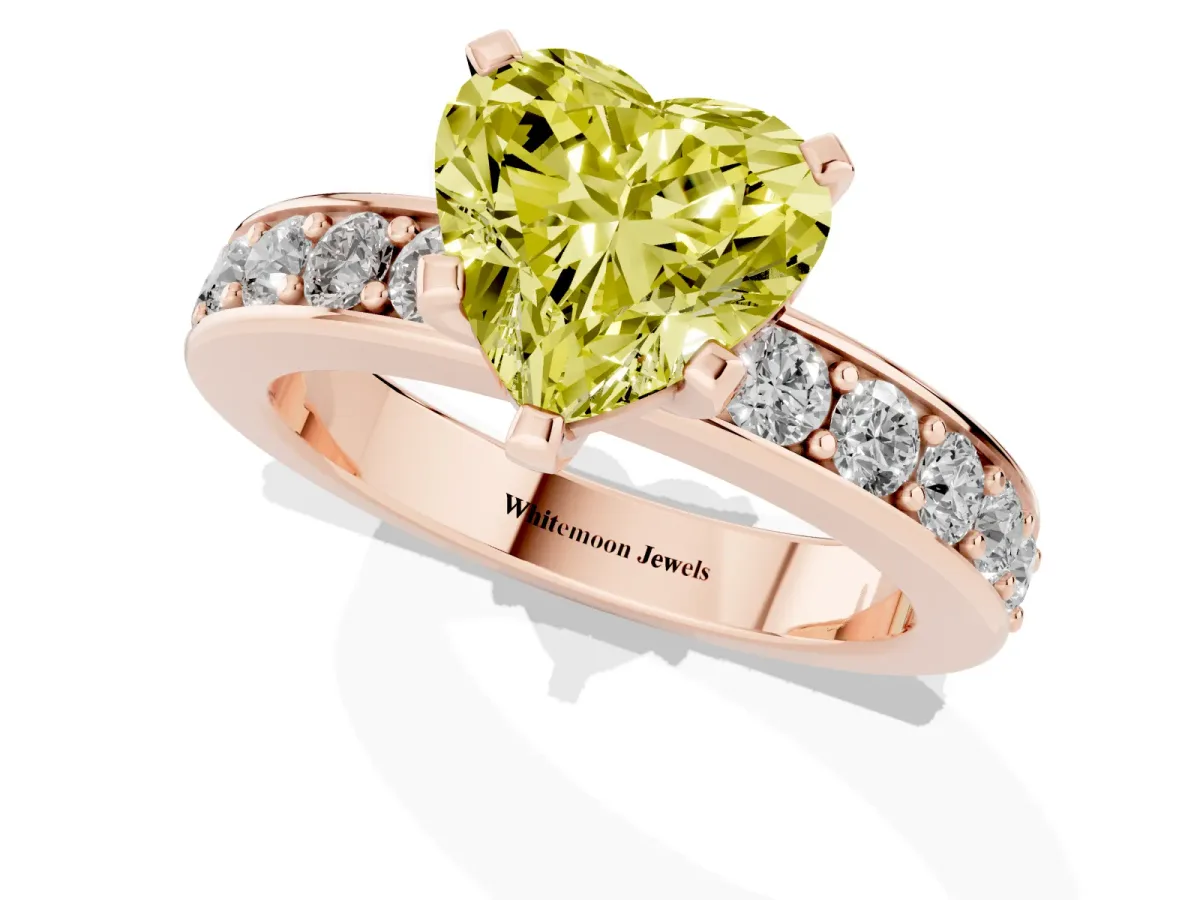 Fancy Yellow Heart Cut Diamond Engagement Ring with Channel Set Round Band and Prong Setting Rose gold