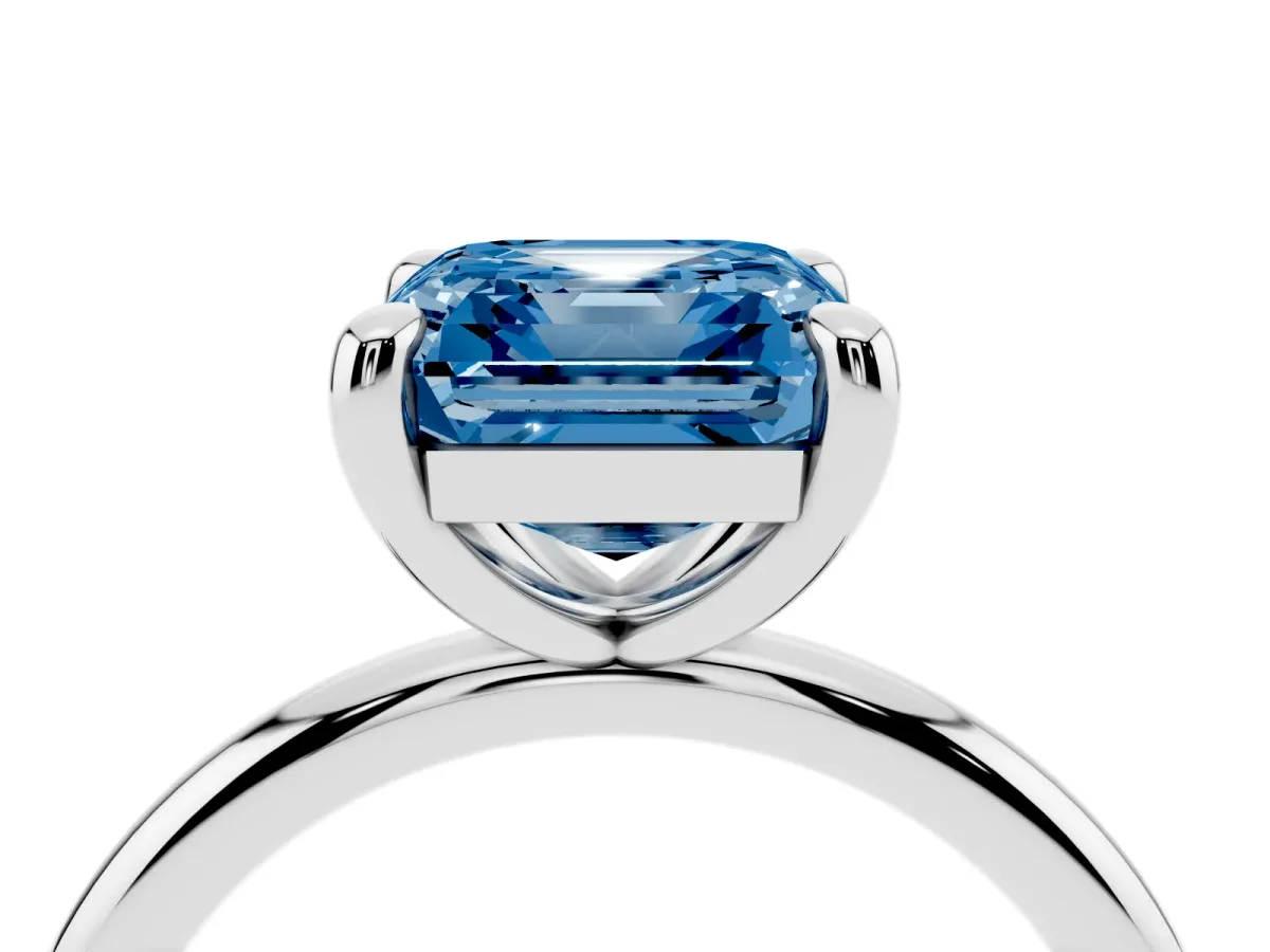 Fancy Blue Asscher Cut Solitaire Diamond Ring with Four-Prong Setting on a Plain Band Platinum