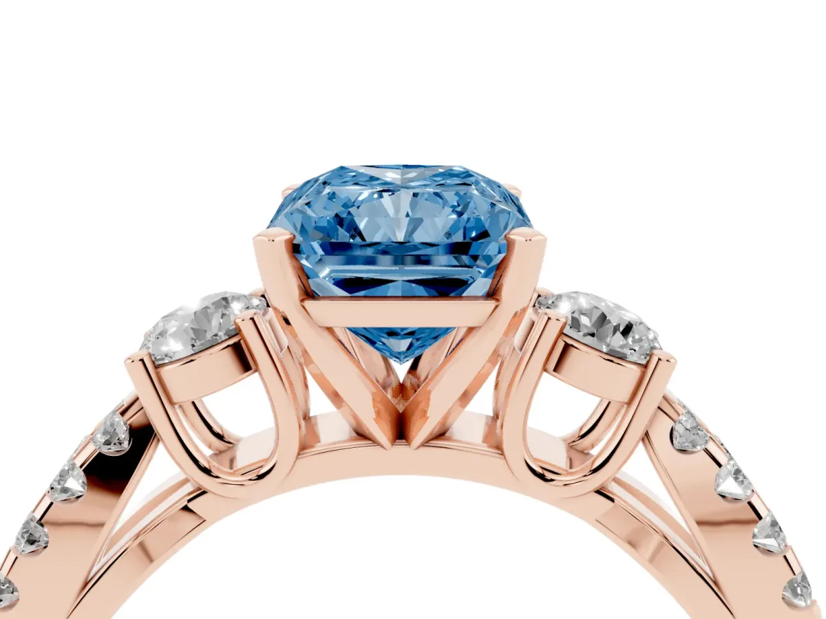 Fancy Blue Radiant Cut Diamond Three-Stone Ring with Pavé Split Shank and Four-Prong Setting Rose gold