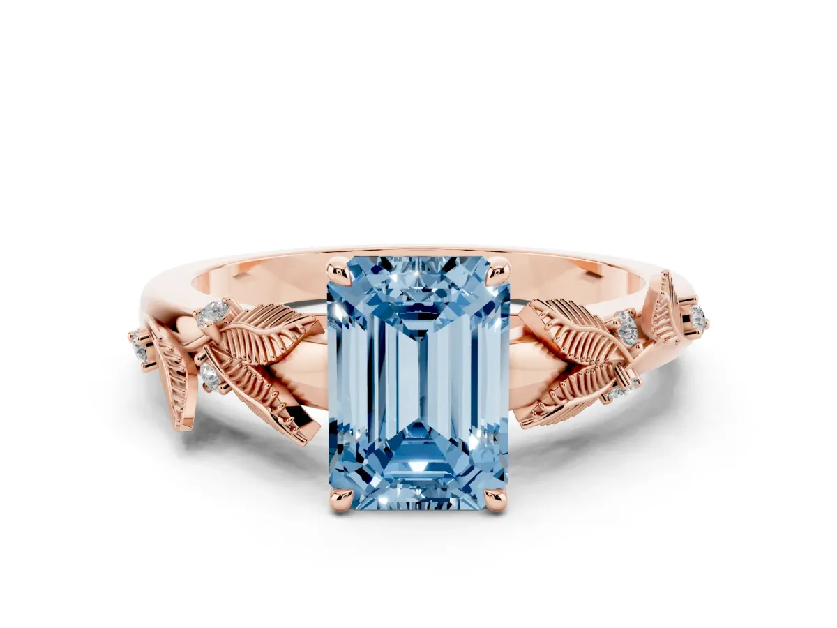 Fancy Blue Emerald Cut Diamond Solitaire Ring with Leaf Motif Band and Four-Prong Setting Rose gold
