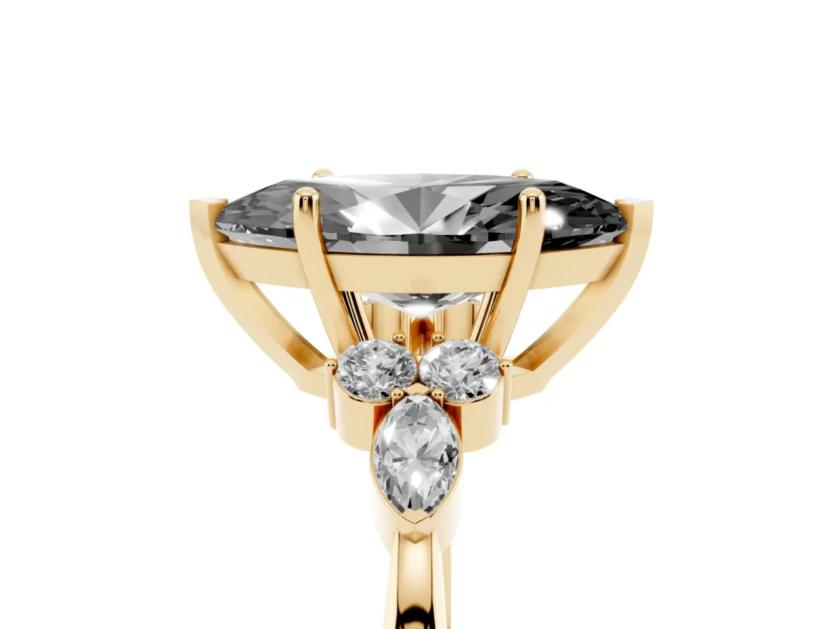 Fancy Black Marquise Cut Brilliant Diamond Solitaire Ring with Pear Side Stones and Four-Prong Setting Yellow gold
