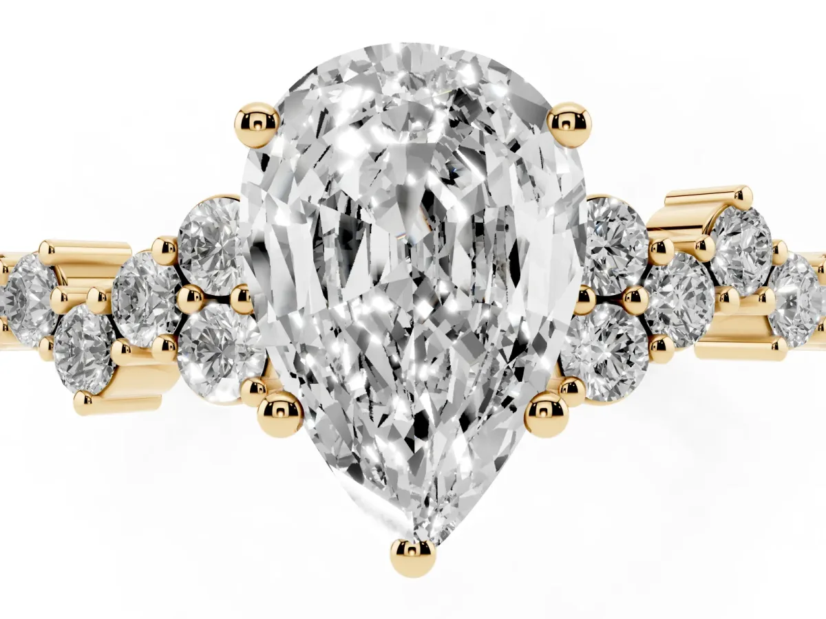 Pear Cut Diamond Scattered Round Accent Ring with Prong Setting Yellow gold