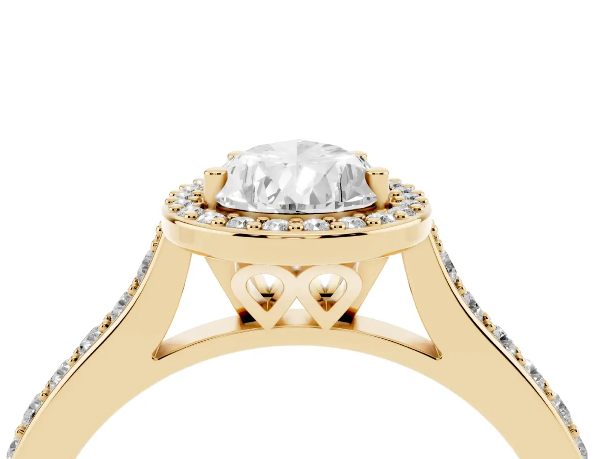 Pear Cut Diamond Halo Engagement Ring with Round Pavé Shoulders and Prong Setting Yellow gold