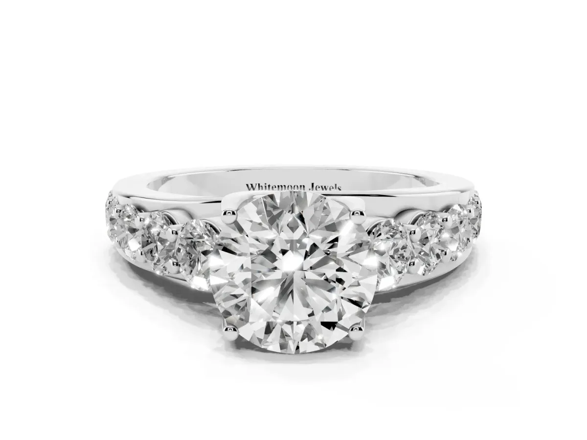 Round Cut Diamond Engagement Ring with Pavé Band and Four-Prong Setting Silver
