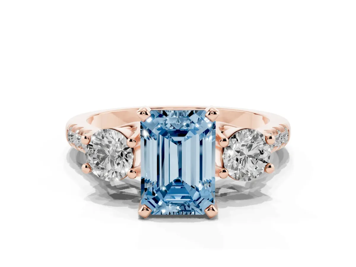 Fancy Blue Three-Stone Emerald Cut Diamond Pavé Band with Four-Prong Setting Rose gold
