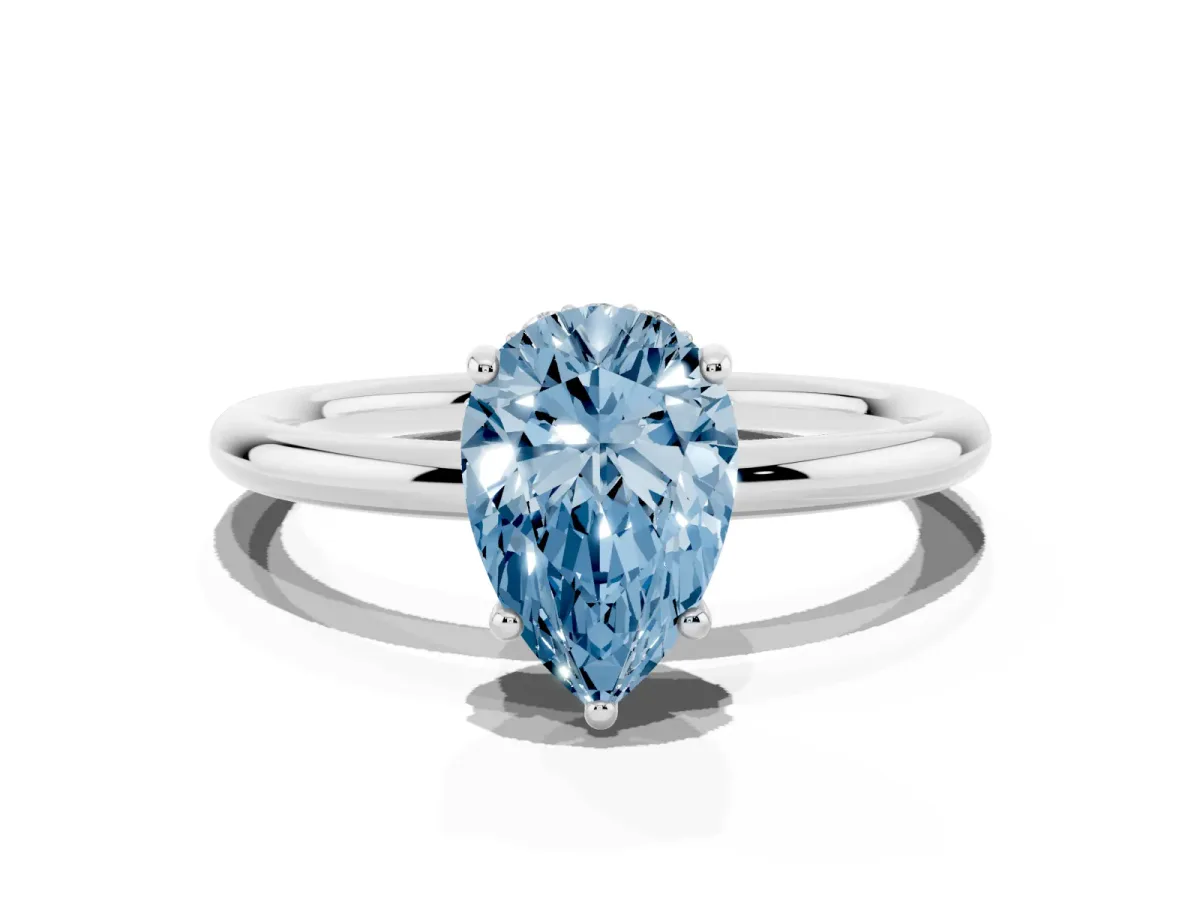 Fancy Blue Pear Cut Solitaire Diamond Ring with a Classic Band and Four-Prong Setting Platinum
