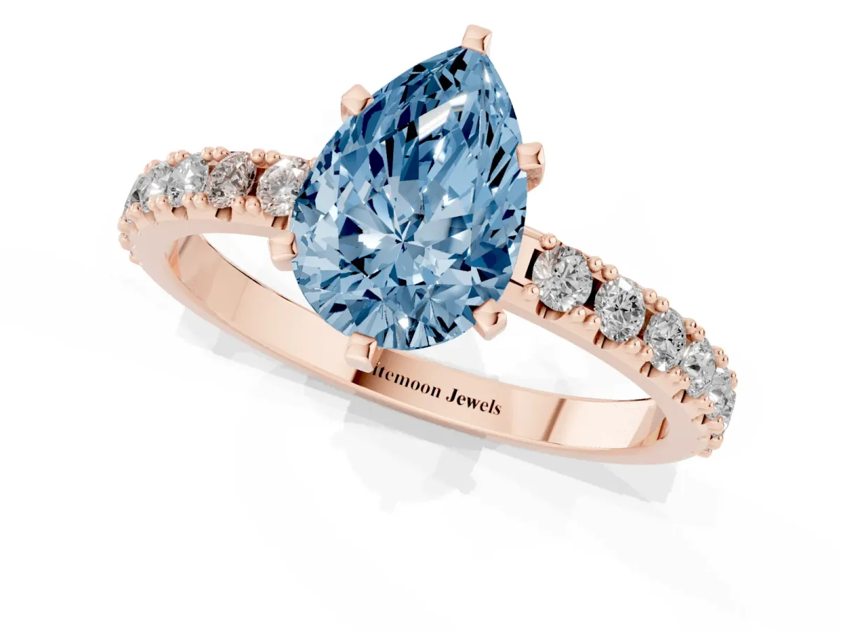 Fancy Blue Pear Cut Diamond Solitaire Pavé Band with Four-Prong Setting Rose gold