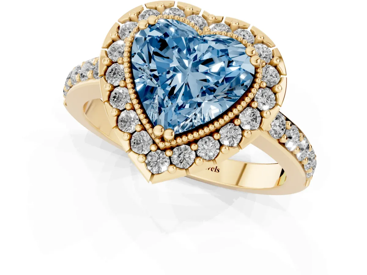Fancy Blue Heart Cut Diamond Halo Ring with Pavé Band and Prong Setting Yellow gold