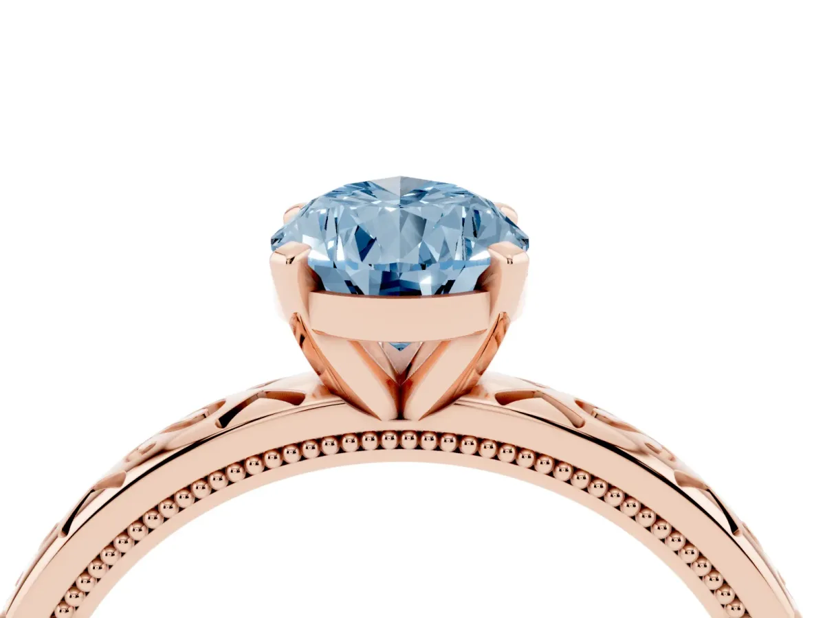 Fancy Blue Pear Cut Solitaire Engagement Ring with Scrollwork Band and Four-Prong Setting Rose gold