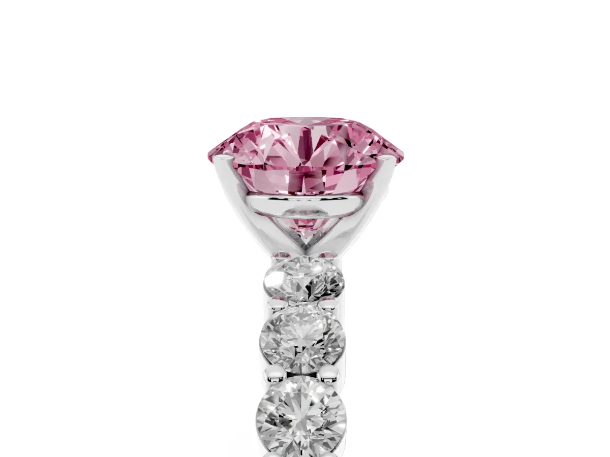 Fancy Pink Round Cut Diamond Solitaire Ring with Shared Prong Round Side Stones Platinum