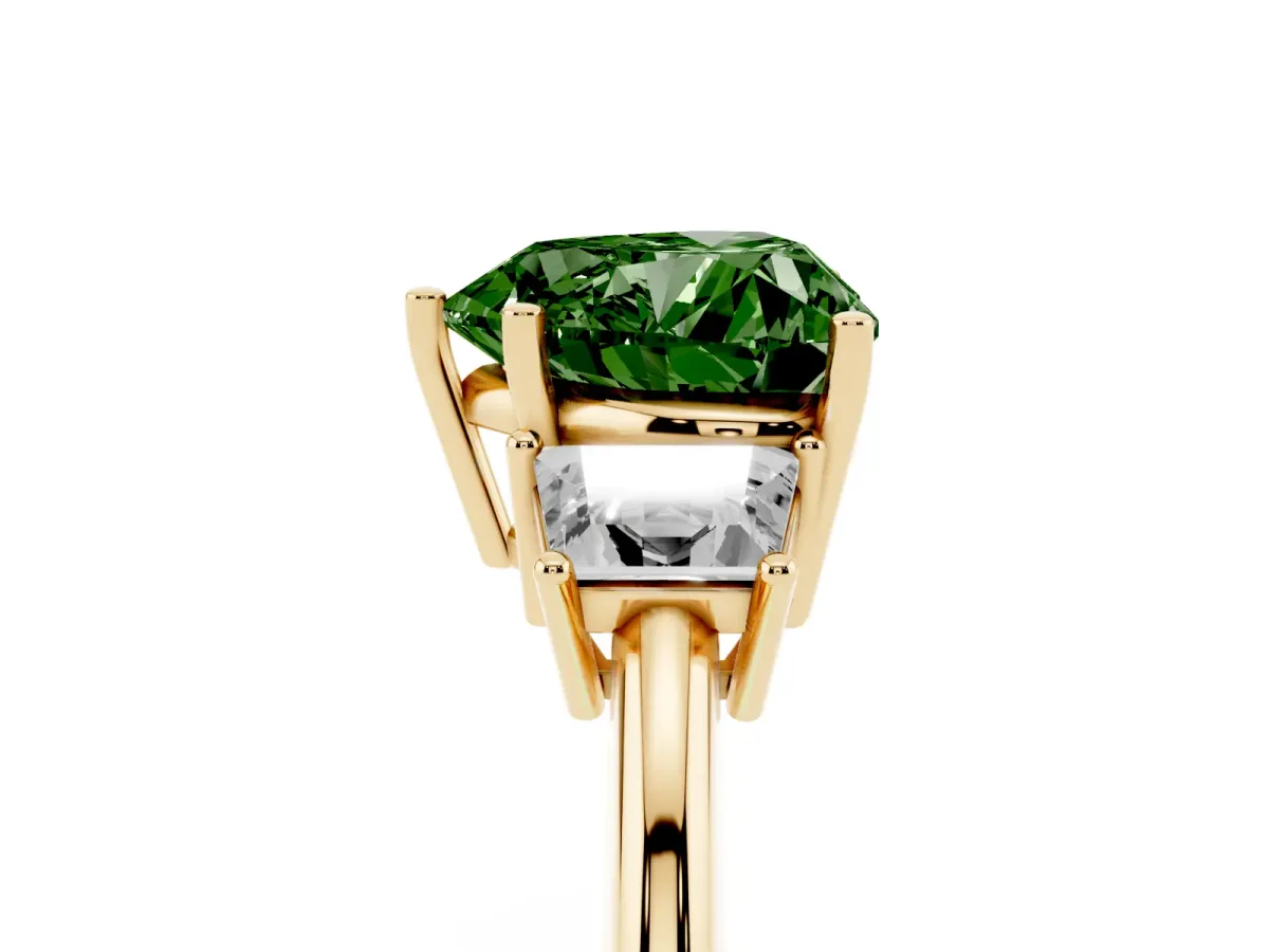Fancy Green Heart Cut Diamond Three-Stone Ring with Trapezoid Side Stones and Prong Setting Yellow gold
