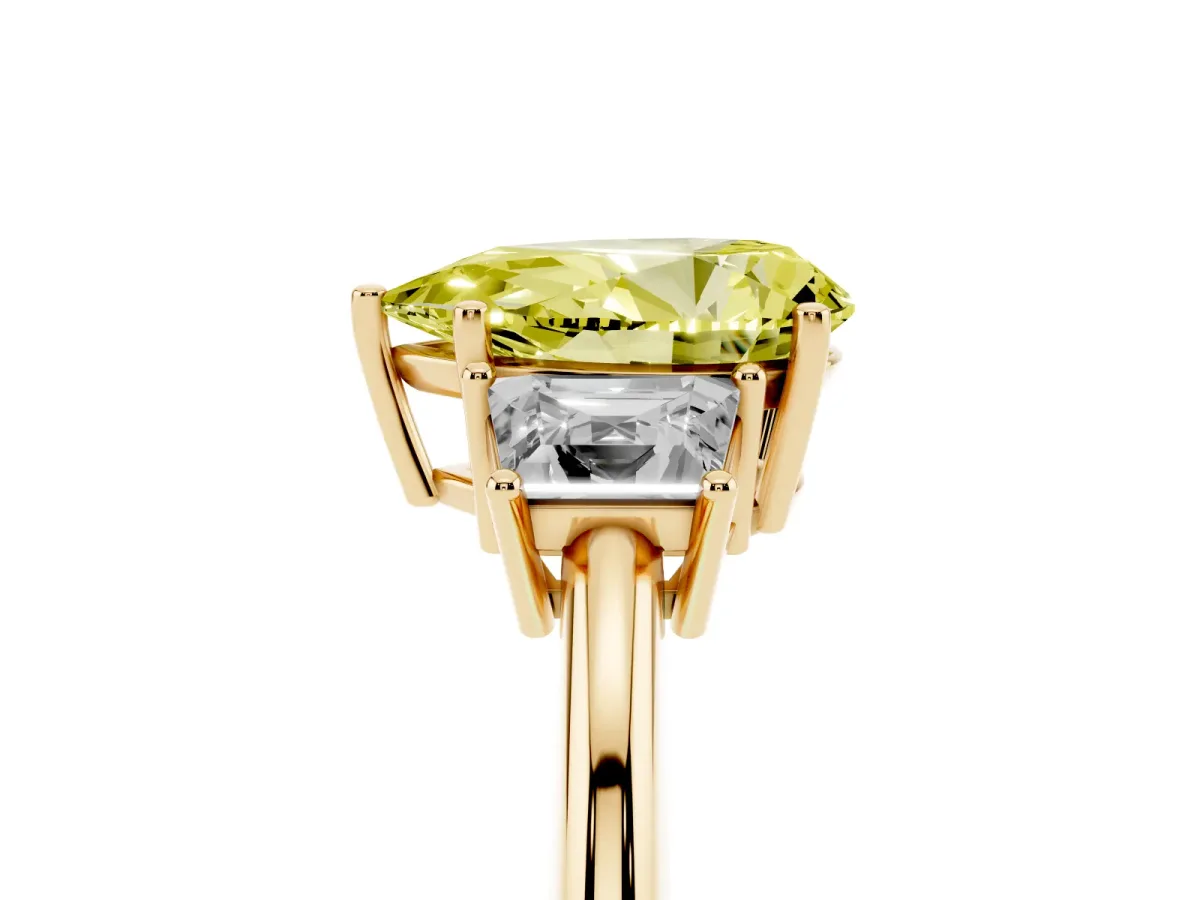 Fancy Yellow Pear Cut Diamond Three-Stone Ring with Trapezoid Side Stones and Prong Setting Yellow gold