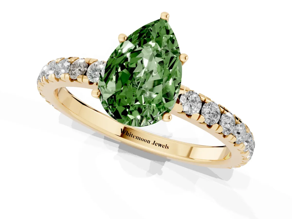Fancy Green Pear Cut Diamond Pavé Solitaire Engagement Ring with Four-Prong Setting Yellow gold