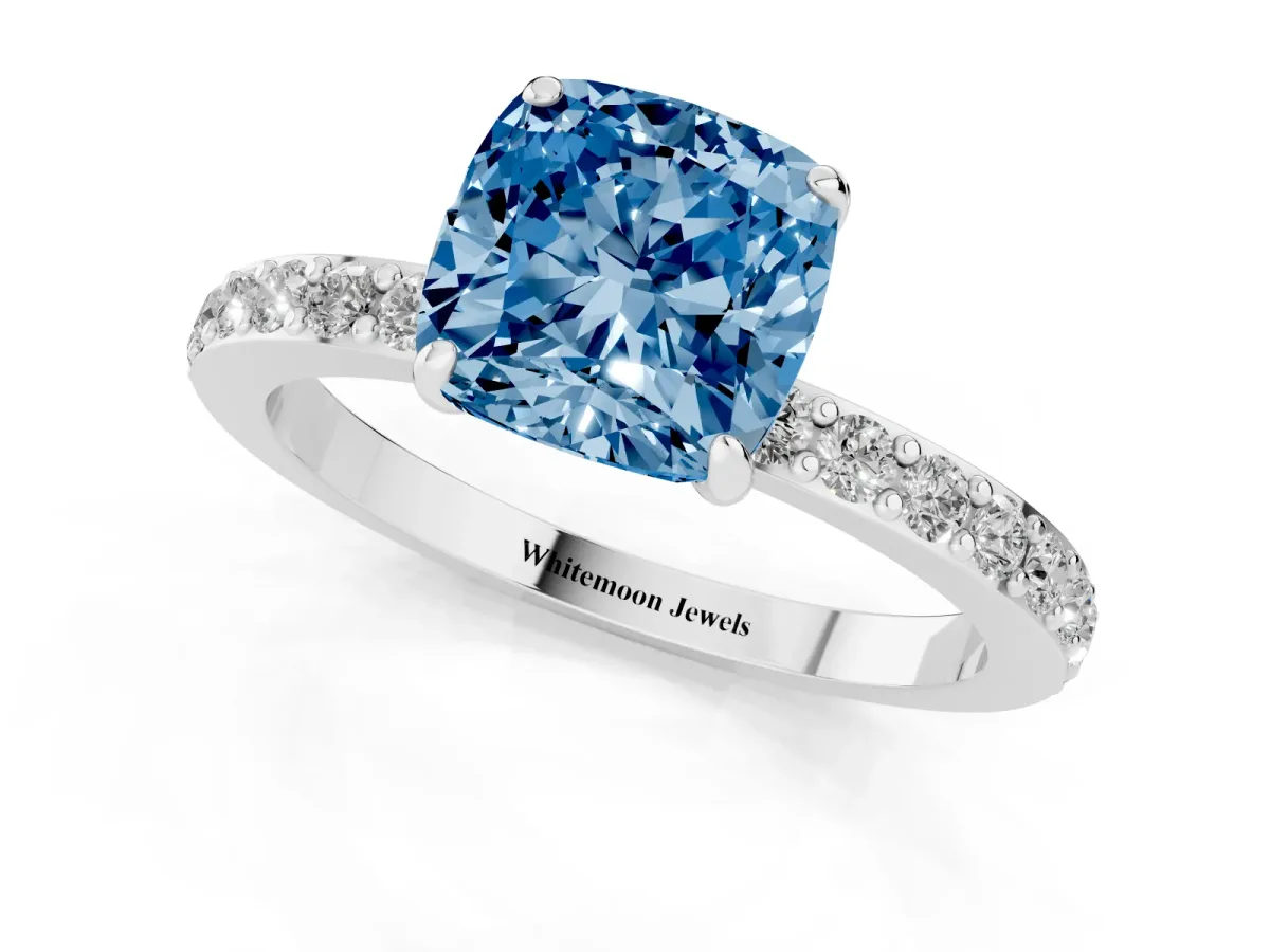 Fancy Blue Cushion Cut Diamond Pavé Engagement Ring with Round Accents and Prong Setting Silver