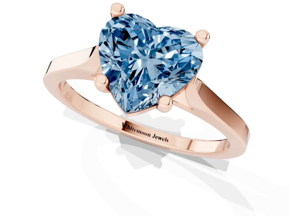 Fancy Blue Heart Cut Solitaire Diamond Ring with Four-Prong Setting and Tapered Band Rose gold