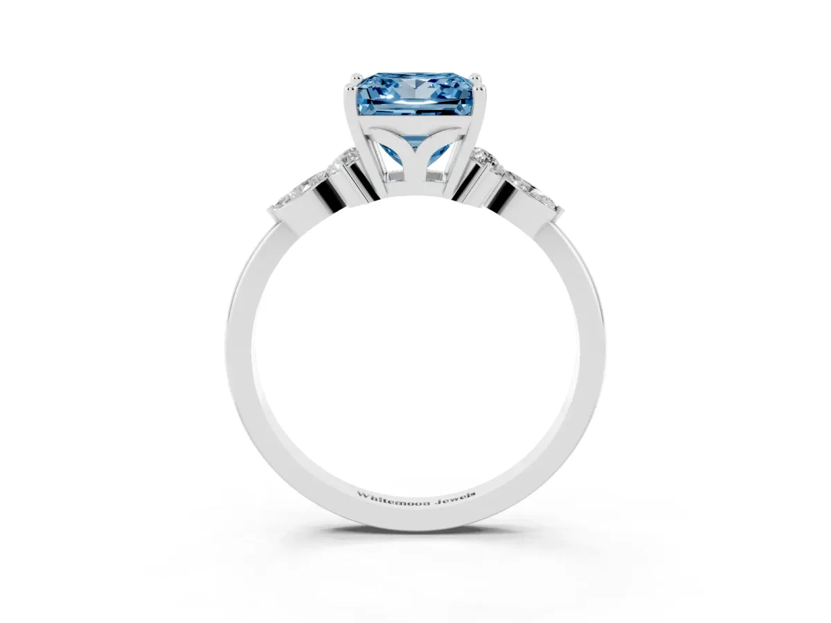 Fancy Blue Princess Cut Brilliant Diamond Solitaire Ring with Pear Side Stones and Four-Prong Setting Silver