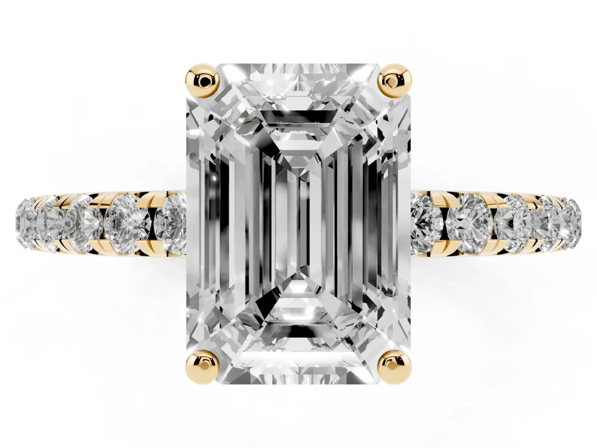 Emerald Cut Cut Diamond Solitaire Ring with Micro Pave Band and Four Prong Setting Yellow gold