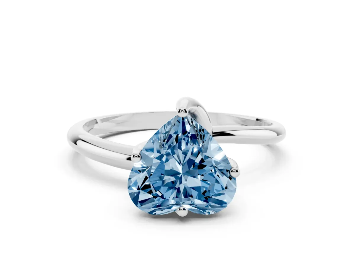 Fancy Blue Heart Cut Diamond Solitaire Engagement Ring with Four-Prong Setting and Classic Band Silver