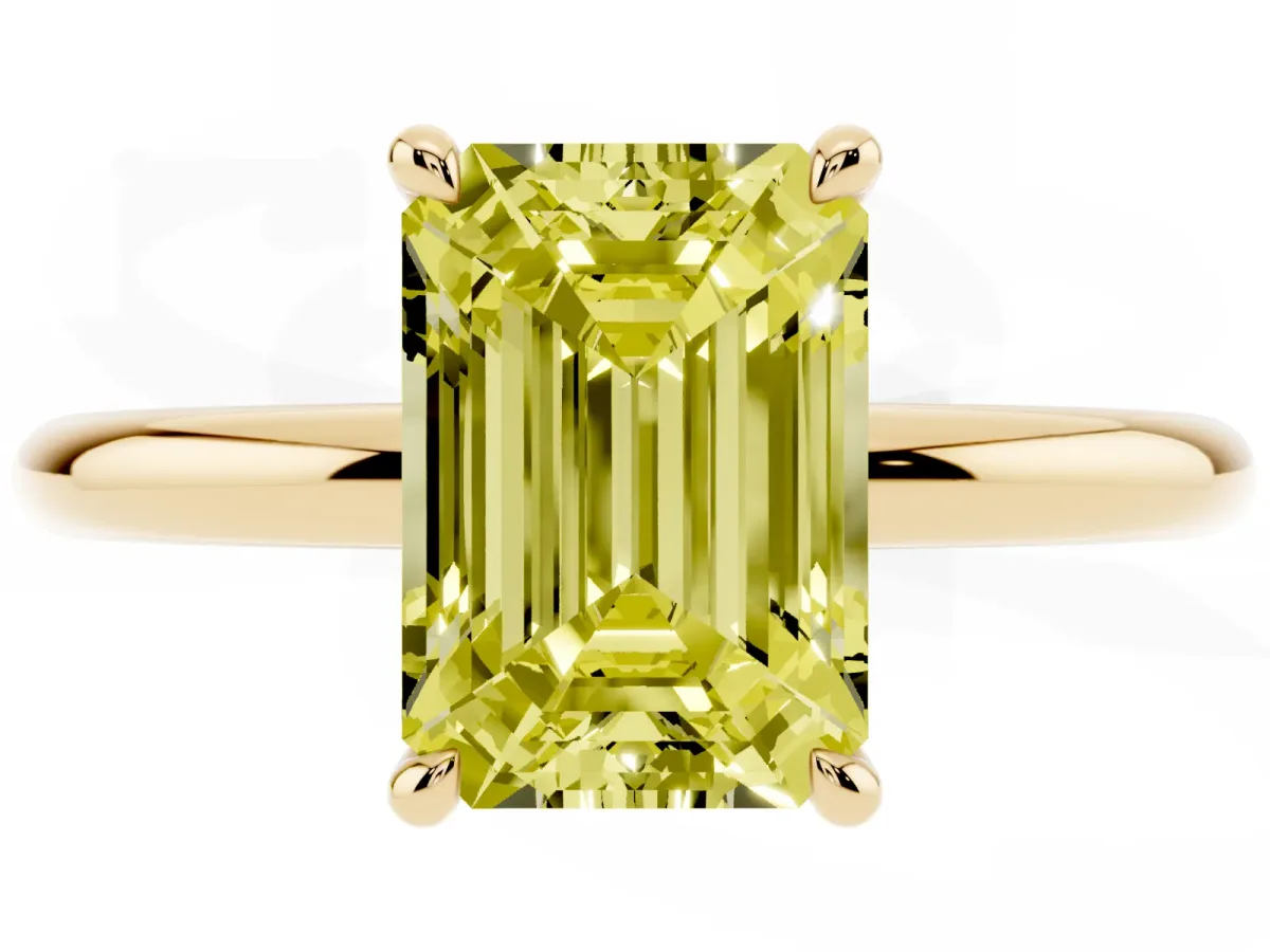 Fancy Yellow Emerald Cut Diamond Solitaire Ring with Thin Band and Four-Prong Setting Yellow gold