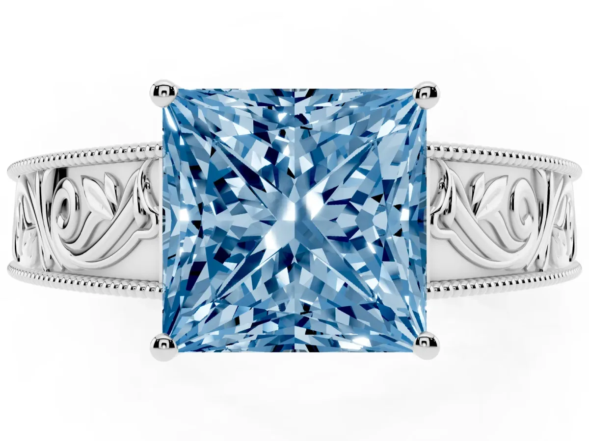 Fancy Blue Princess Cut Diamond Solitaire Ring with Engraved Band and Four-Prong Setting White gold