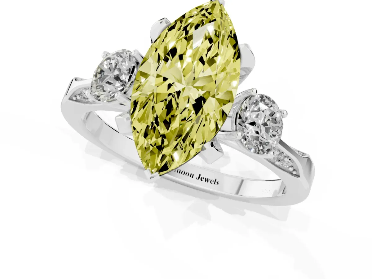 Fancy Yellow Marquise Cut Brilliant Three-Stone Diamond Ring with Pavé Band and Four-Prong Setting Platinum