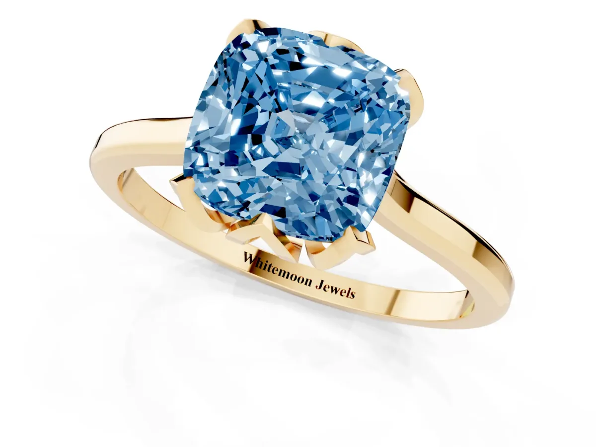 Fancy Blue Cushion Cut Diamond Solitaire Ring with Flower Prong Setting and Classic Band Yellow gold