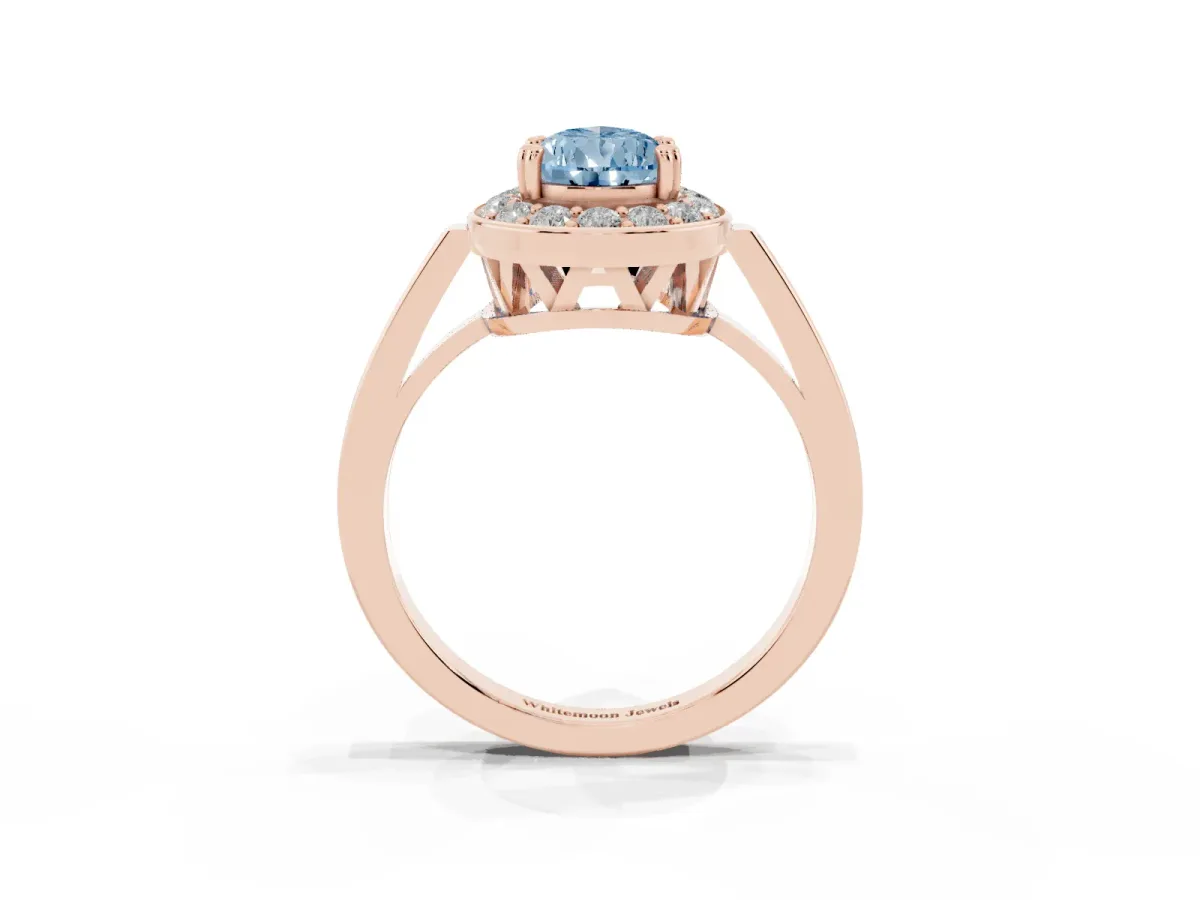 Fancy Blue Pear Cut Diamond Halo Ring with Split Shank and Four-Prong Setting Rose gold