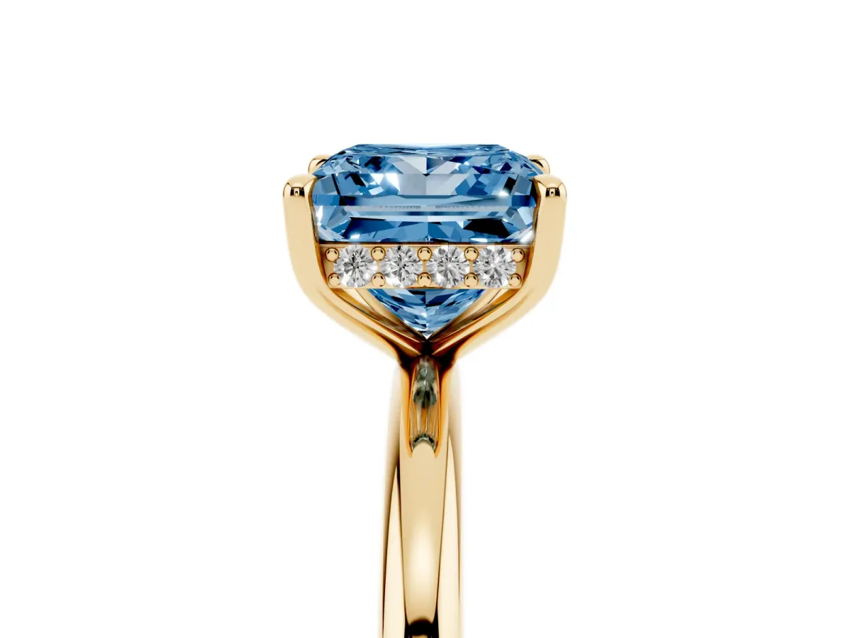 Fancy Blue Princess Cut Diamond Solitaire Ring with Thin Band and Four-Prong Setting Yellow gold