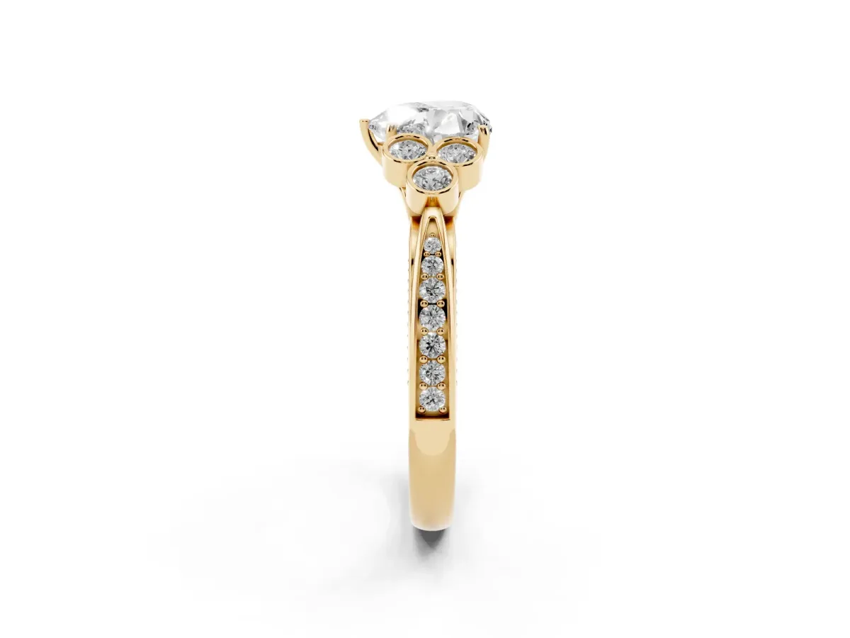 Heart Cut Cut Diamond Engagement Ring with Bezel Set Round Side Stones and Prong Setting Yellow gold