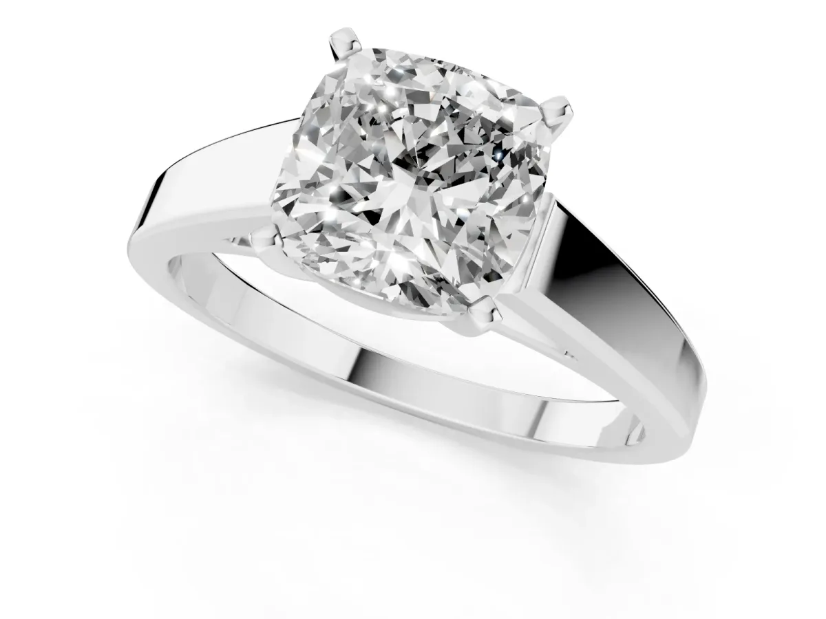 Cushion Cut Solitaire Engagement Ring with Four-Prong Setting and Tapered Band Platinum