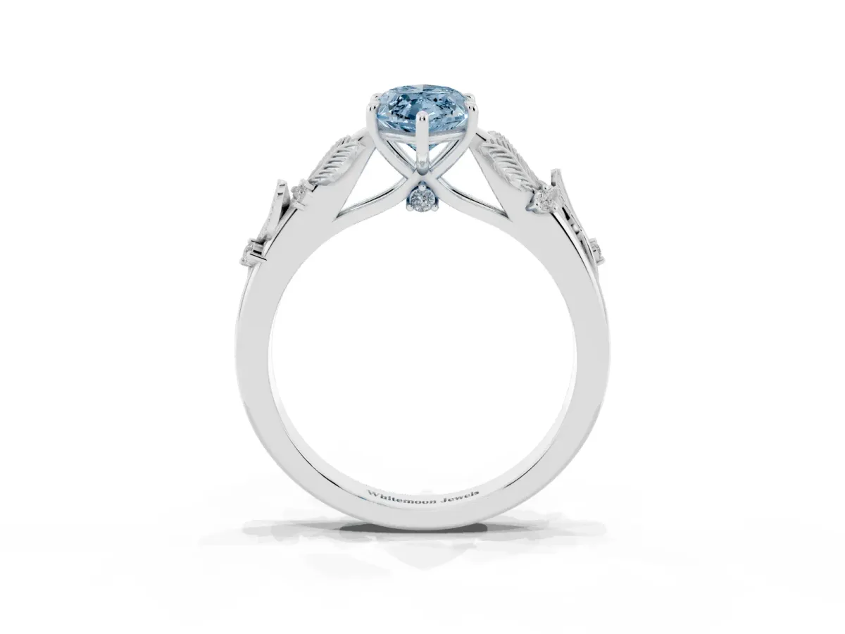 Fancy Blue Marquise Cut Diamond Solitaire Ring with Leaf Motif Band and Four-Prong Setting Platinum