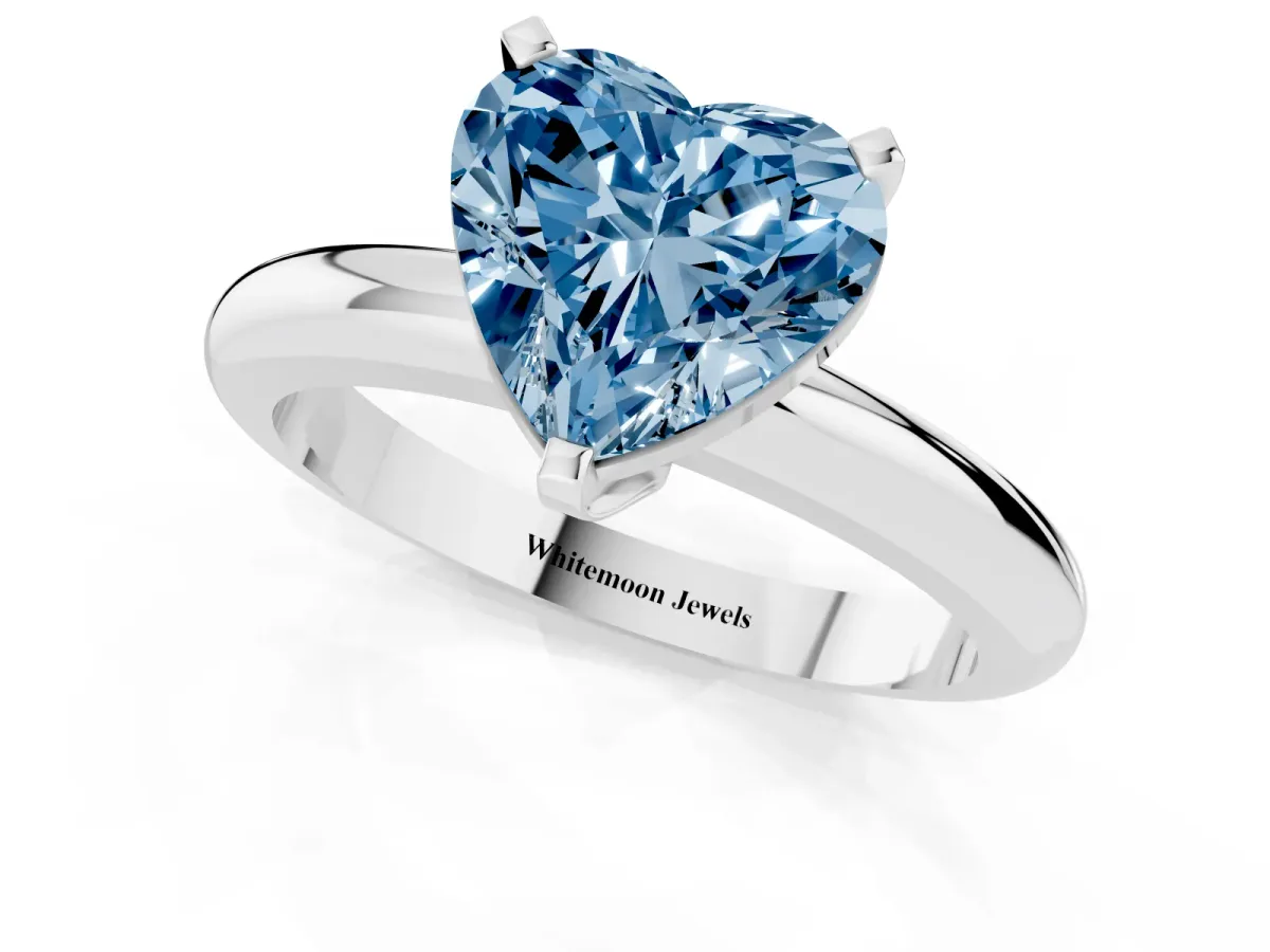 Fancy Blue Heart Cut Diamond Solitaire Engagement Ring with Round Band and Four-Prong Setting White gold